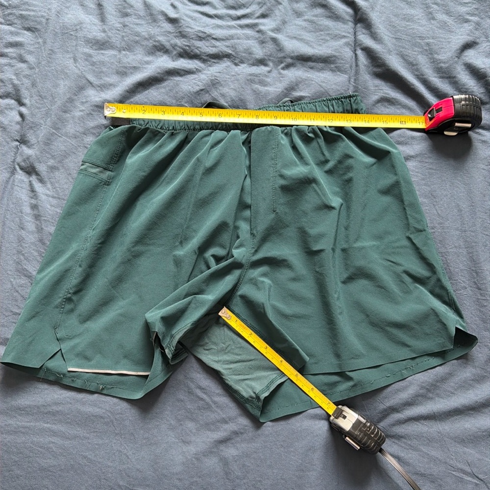 LULULEMON MEN SHORTS, large no pockets except rear. 5" inseam.